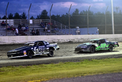 Jason McClatchie (70) wins over Shawn Duquette (18) in the Hartson Total Opening Renegades A Main