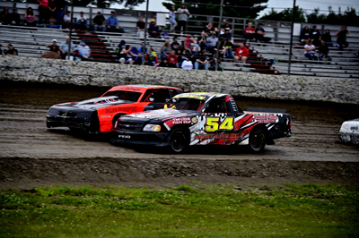 Josh Terry (43) wins over Tyler Irwin (54) in the Hartson Total Opening Renegades A Main Josh Terry (43) wins over Tyler Irwin (54) in the Hartson Total Opening Renegades A Main