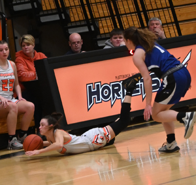 diving for the loose ball