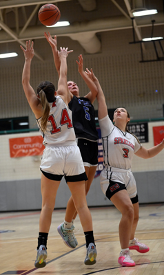 between the defenders