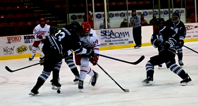 battle for loose puck