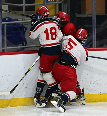 hard into the boards