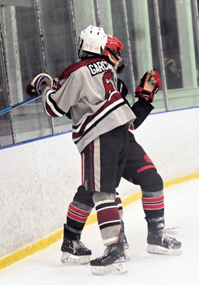 hard hit into the boards