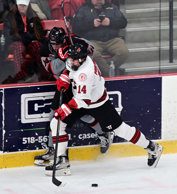 hard into the boards hard into the boards