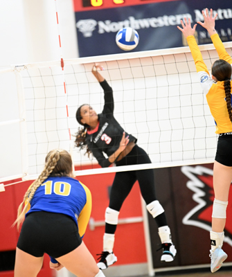 spike between the defenders